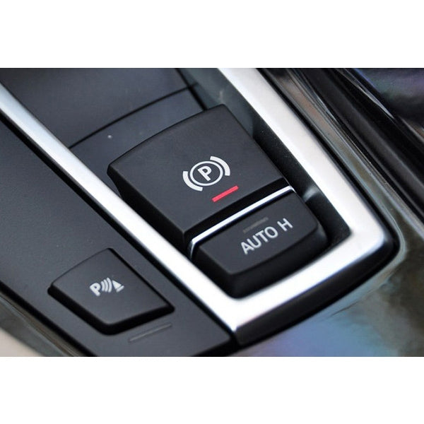 Auto H switch cover button in car console, black with “AUTO H” text