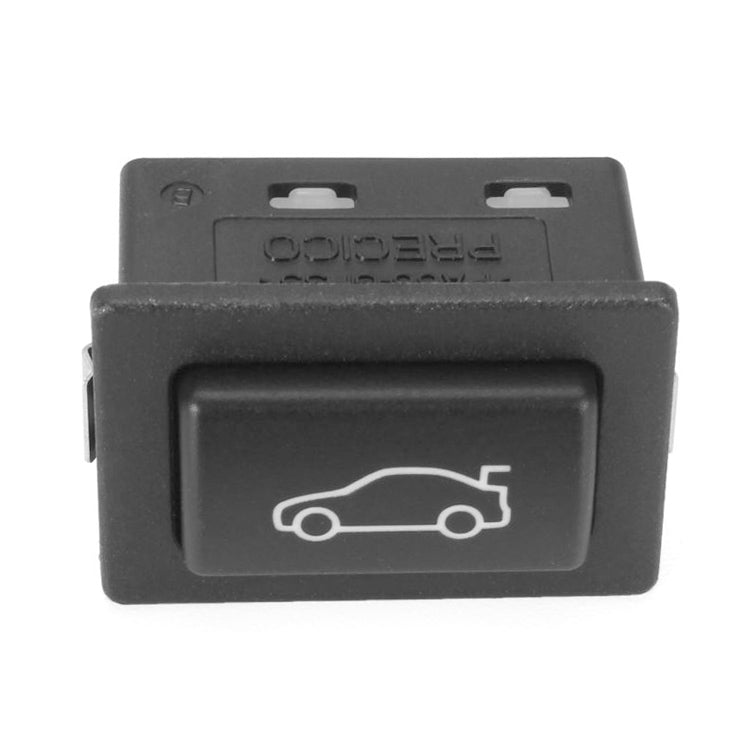 Black trunk release switch button with white car icon on the front face