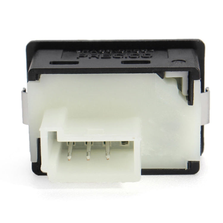 Trunk release switch button assembly back view with exposed white wiring connector