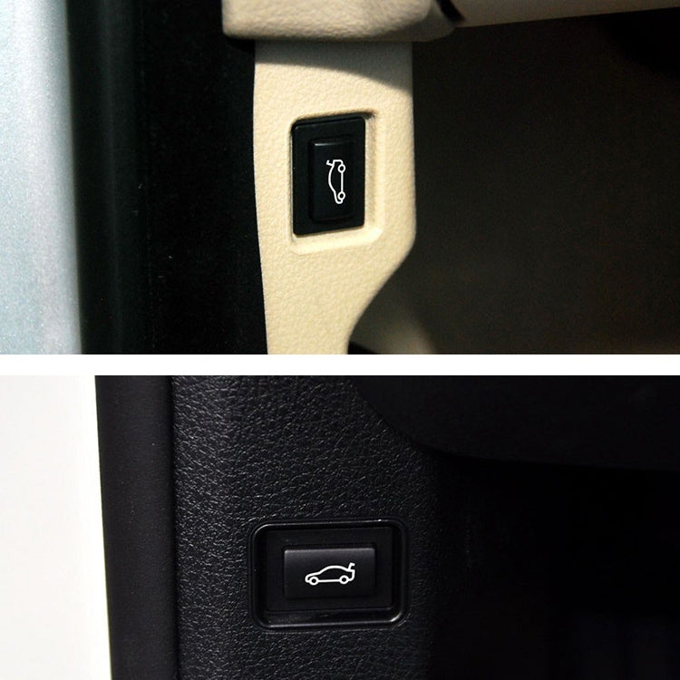 Installed trunk release switch button on car interior trim with small car icon