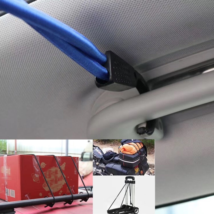 Blue elastic rope strap with black clamp secured near car ceiling trim