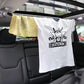 Blue elastic rope strap holding a white T-shirt inside the car