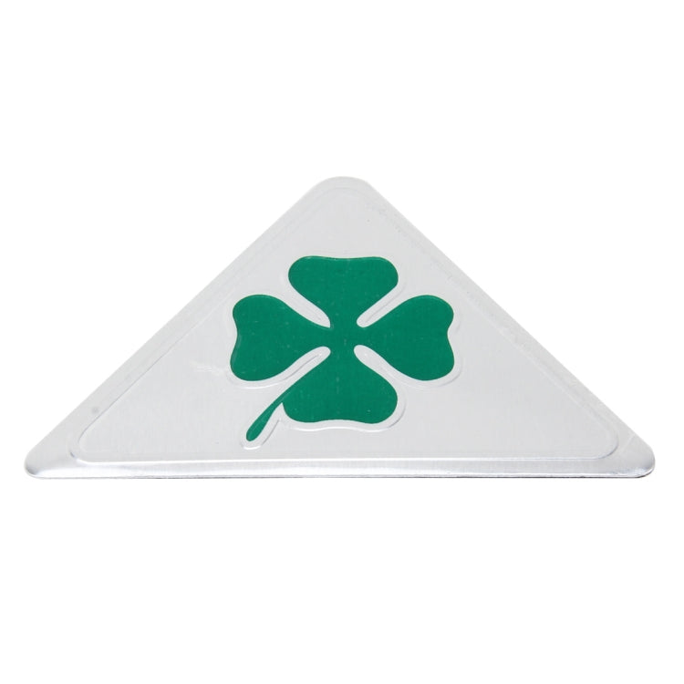 Triangular aluminum badge with centered green four-leaf clover symbol