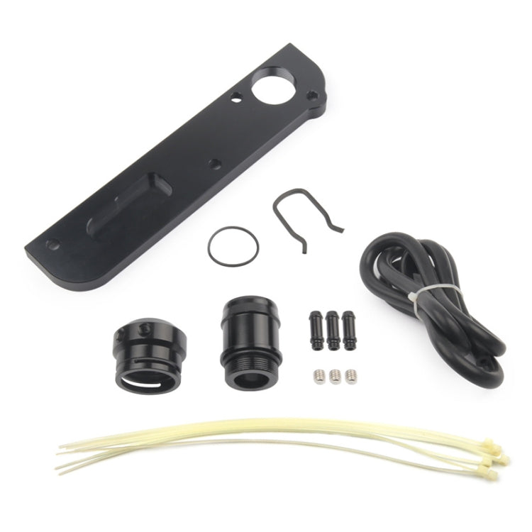 Black PCV delete plate kit components: wiring harness, rings, bolts, and adapter parts