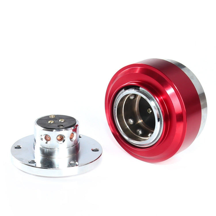 Red quick-release steering wheel hub adapter with matching base and mounting bolts