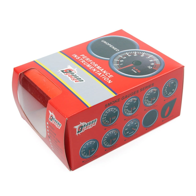 Tachometer gauge in red retail box with RPM dial artwork
