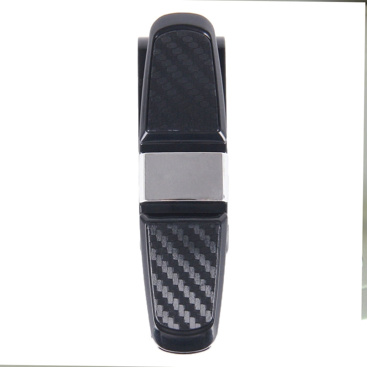 Vehicle mounted glasses clip with vertical black carbon-fiber strap and metal latch
