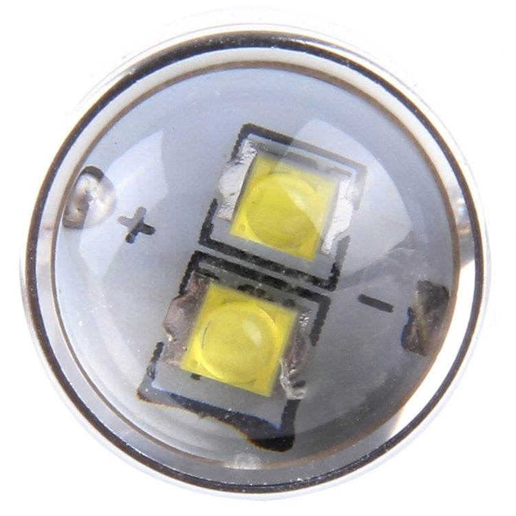 LED car light bulb top view with clear cover and four yellow LED chips