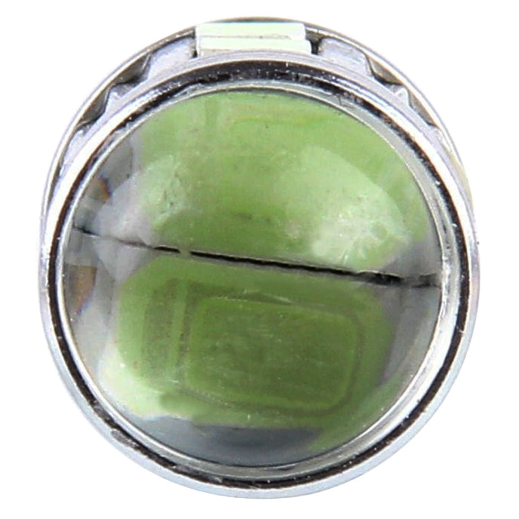 Front view of T10 LED bulb lens, showing greenish LED glow
