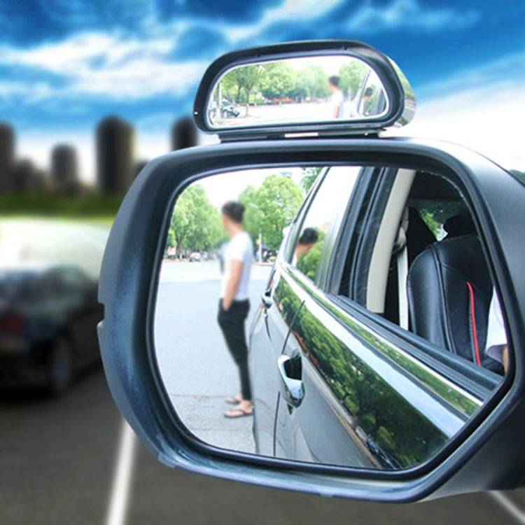 Car auxiliary blind spot mirror with wide-angle lens, black frame, mounted on side