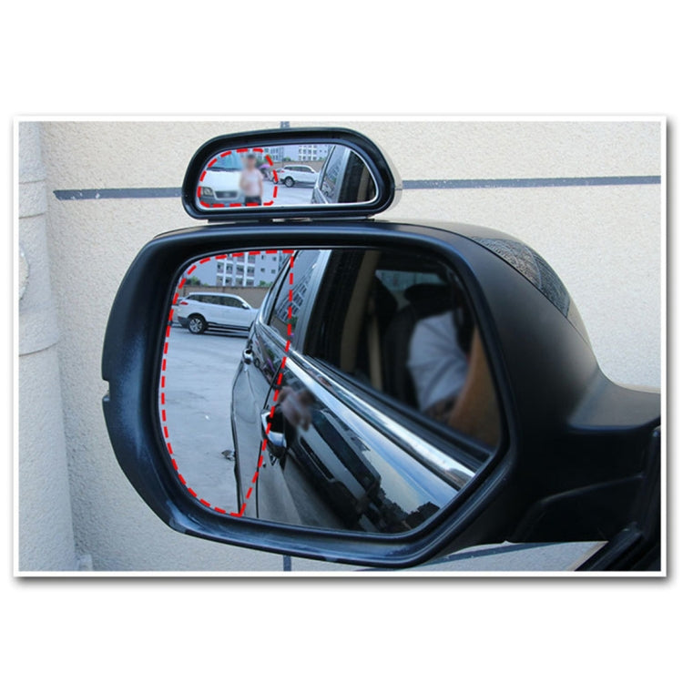 Mounted auxiliary blind spot mirror with red dashed coverage lines on side window
