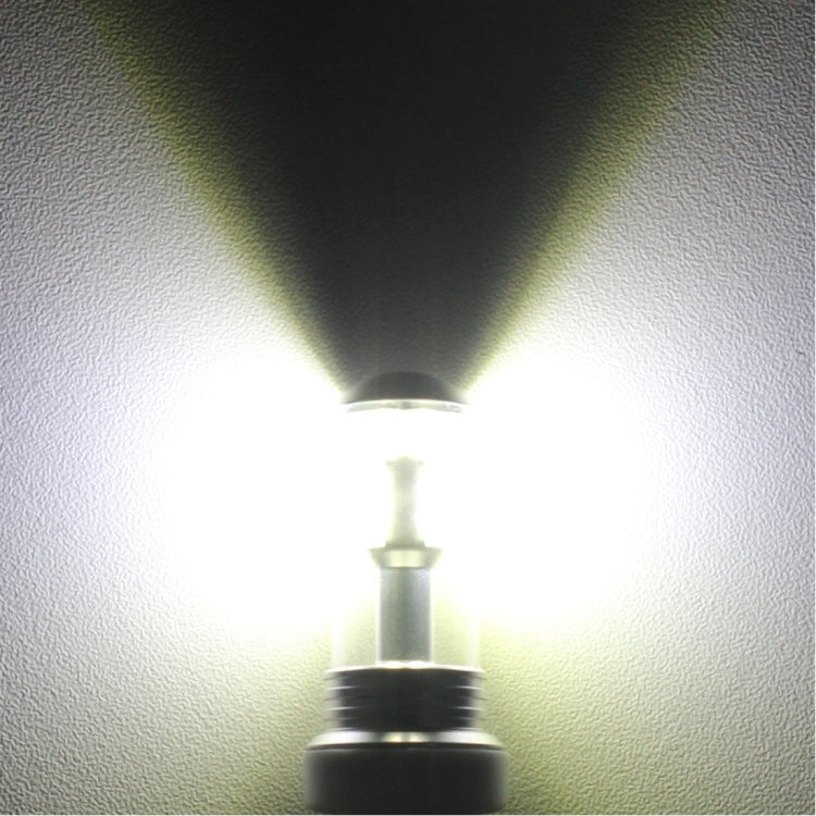 9006 LED fog light bulb emitting a bright white beam from the front of the lamp