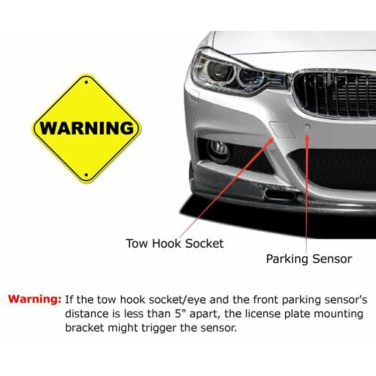 Car front showing tow hook socket area for license plate mounting