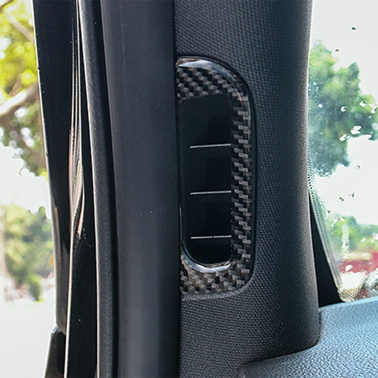 Installed black carbon fiber-look air vent trim sticker on car A-pillar panel