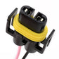 Close-up of H11 bulb holder male socket base with wire, black plastic and yellow insulator
