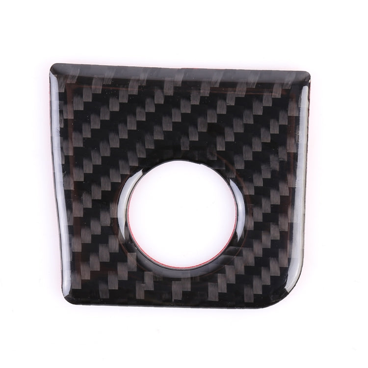 Square storage button sticker with black carbon fiber pattern and round white center