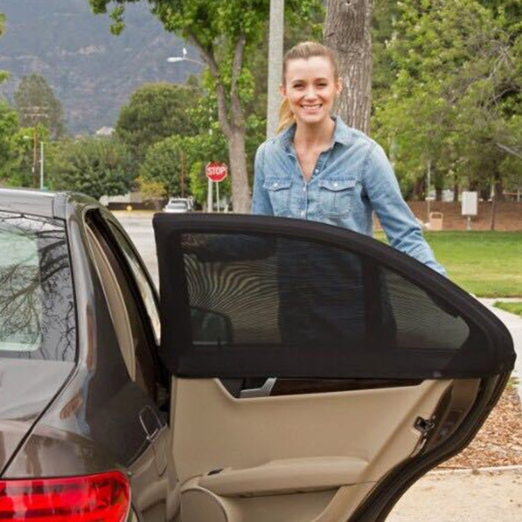 Black mesh car window sunshade net installed on side window opening