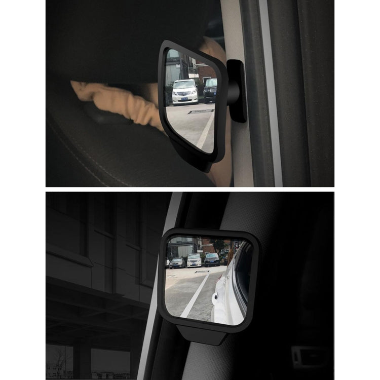 Adjustable wide-angle blind spot mirror attached to car door, angled glass view