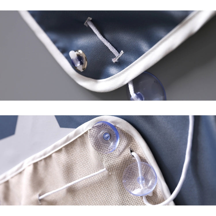 Car sunshade cover close-up showing stitched edge and grommet hardware on fabric