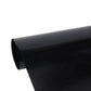 Car window tint film roll, close-up of glossy dark edge