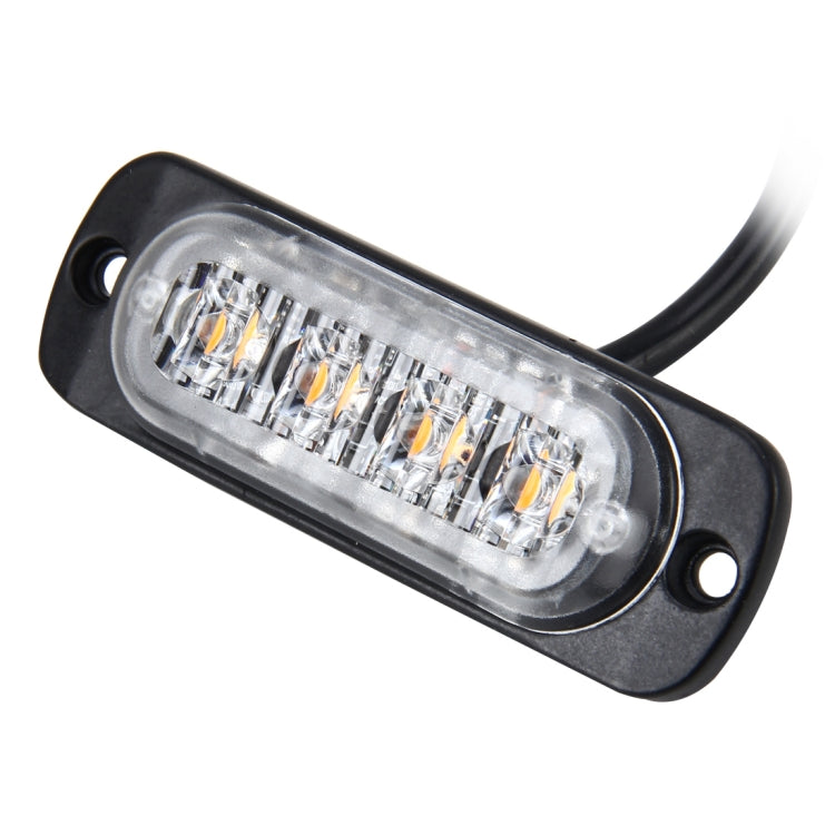 Compact black strobe light bar with clear front lens and 4 LED chips, side mounting holes