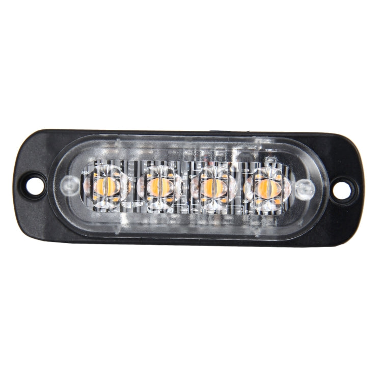 Clear-lens emergency strobe light showing 4 amber LED modules in a black housing