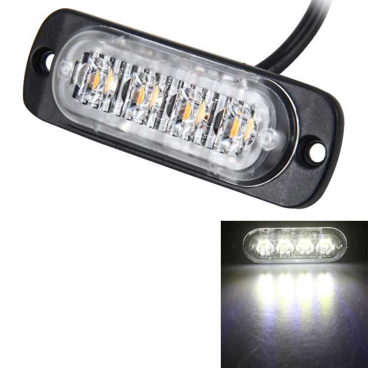 LED strobe light glowing white from a clear rectangular lens over a black base