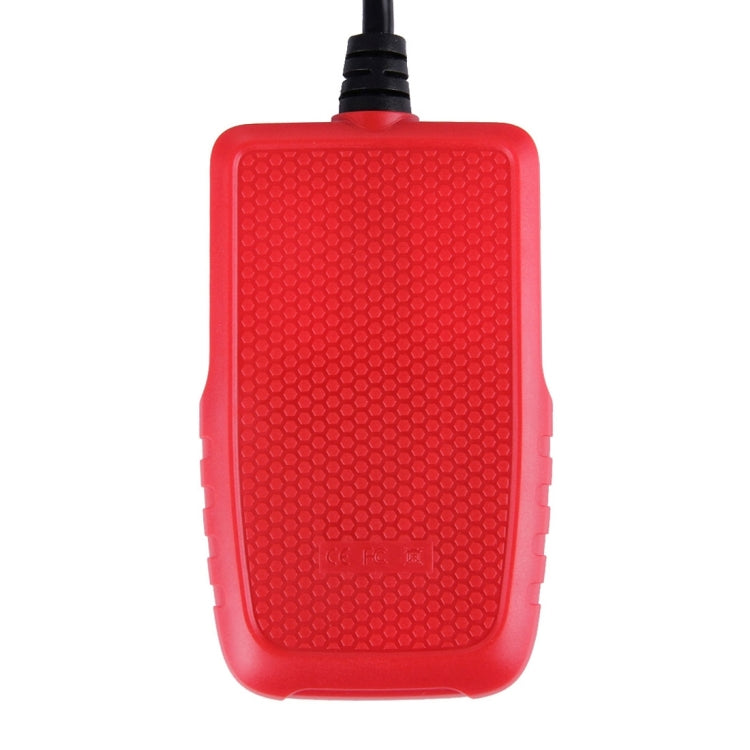 Red back of handheld OBDII code reader with textured grip panel