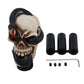 Resin skull gear shift knob kit with three caps, screws, and black textured base