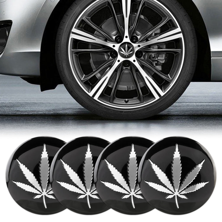 Set of 4 round car wheel hub stickers with black finish and white leaf artwork