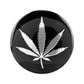Round car wheel hub sticker with black base and white cannabis leaf design