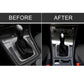 Car center console with carbon fiber gear shift trim installed in gear area
