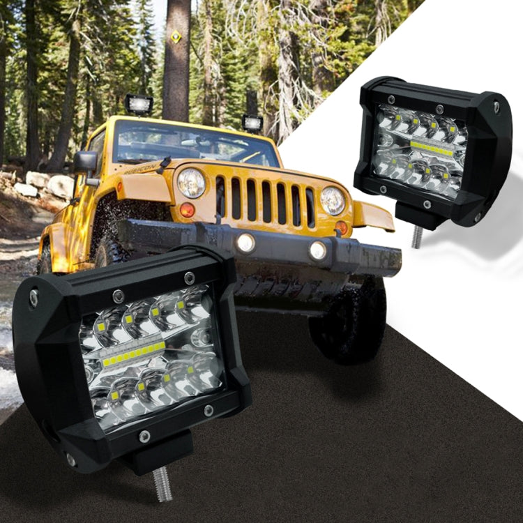 Pair of black LED off-road work lights with square housings and metal mounting studs