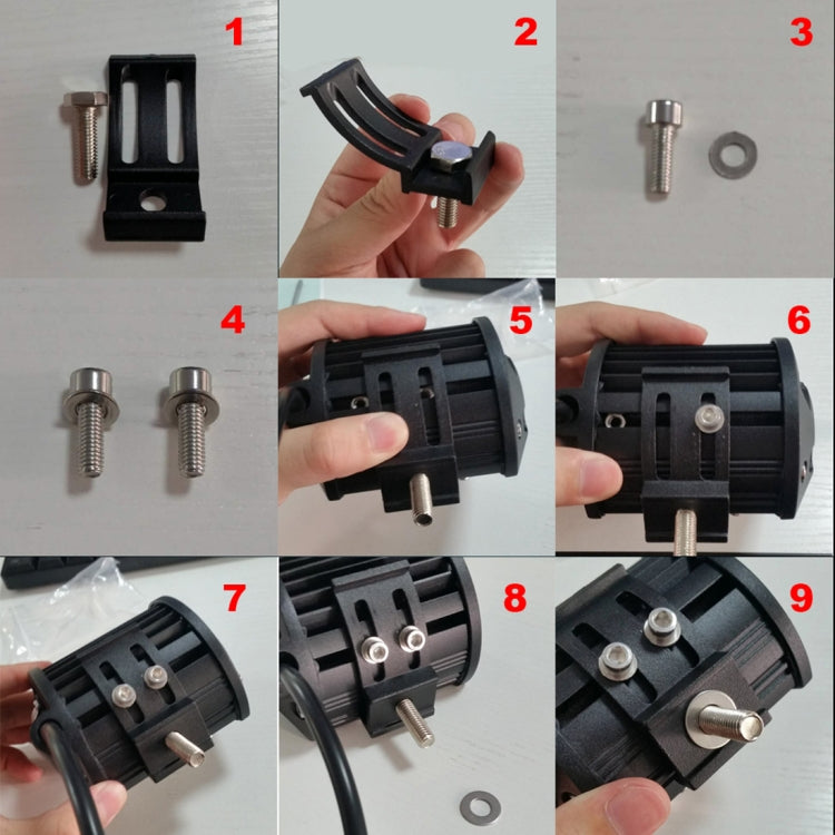 Black LED light bar mounting bracket with bolts and washers, close-up hardware