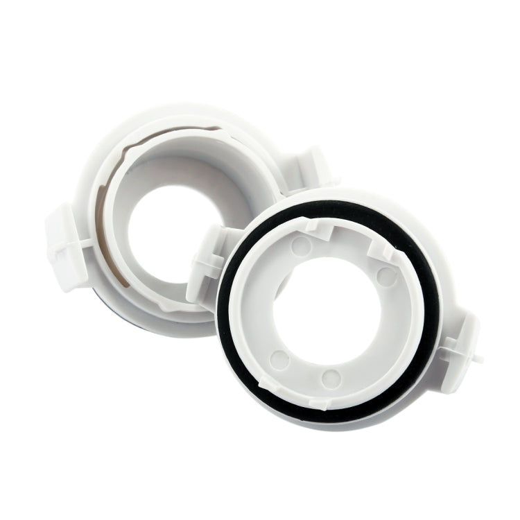 Headlight bulb retainer adapter pair with open circular sockets and black sealing edge