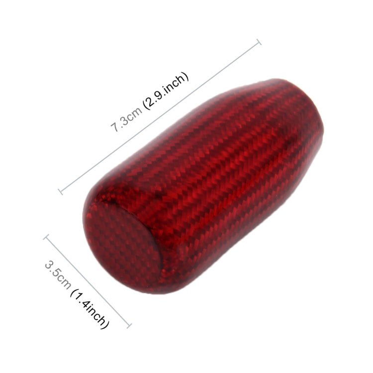 Red carbon-fiber style gear shift knob cover, smooth rounded profile.