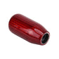 Red carbon-fiber style gear shift knob cover with black inner sleeve opening.