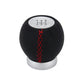 Black leather shift knob with red stitched pattern and numbered 5-speed top