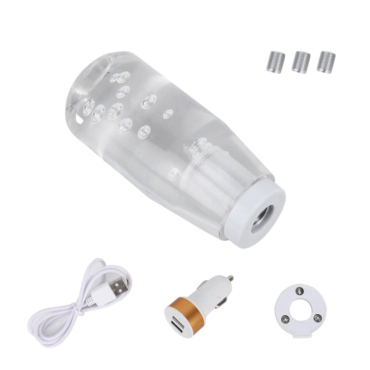 Transparent LED shift knob light kit with cable, spare screws, and adapter parts