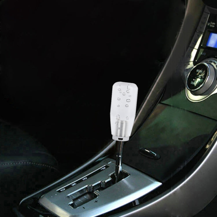 Universal LED gear shifter knob light topper installed on car center console