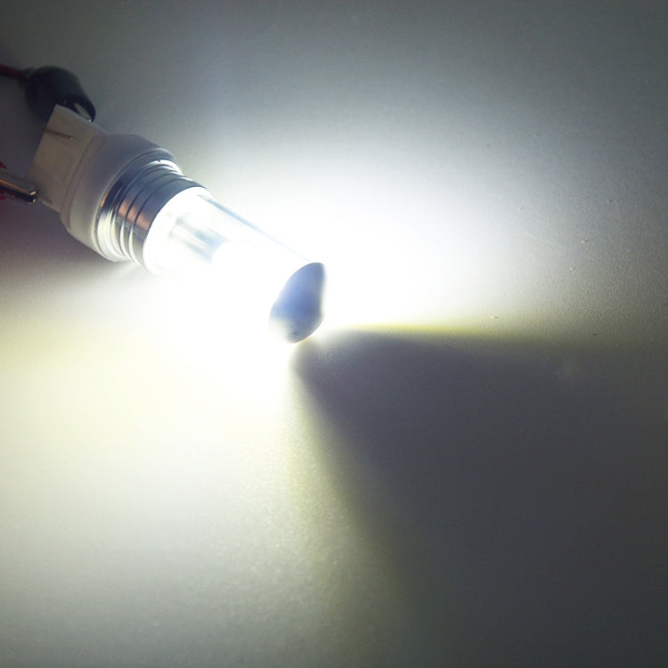 Motorcycle LED headlight bulb emitting bright white light beam