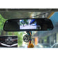 In-car rearview monitor showing reverse camera view on built-in screen