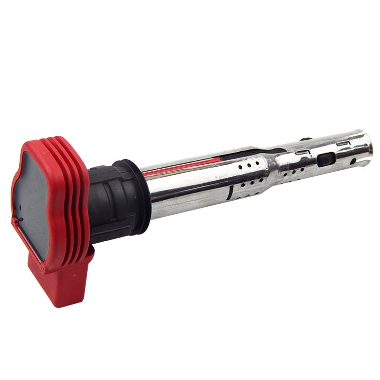 Ignition coil with red cap, black rubber boot, and silver metal body