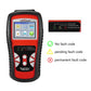 Red and black handheld OBD2 scan tool showing fault code status icons on screen