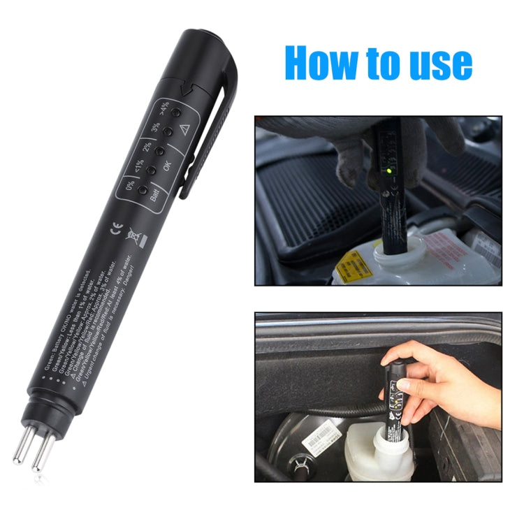 Brake fluid tester tool in use at car brake fluid reservoir, LED indicator lit