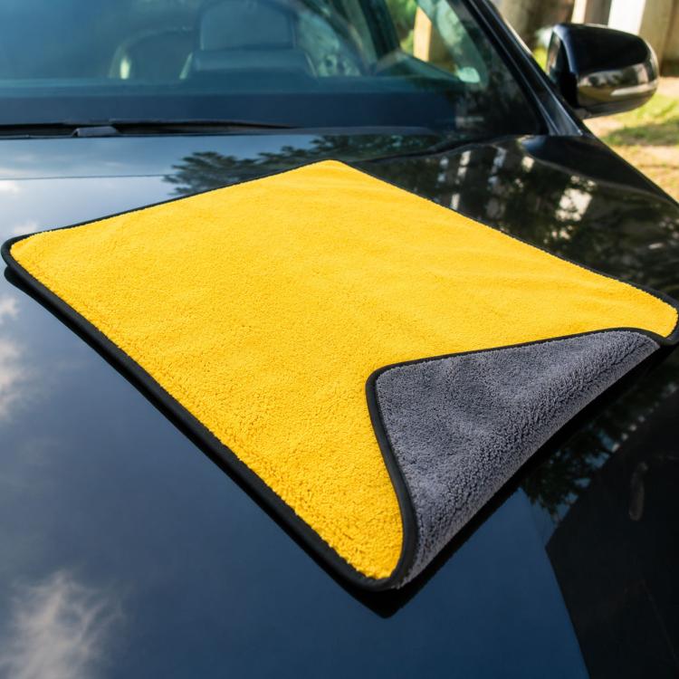 Microfiber car cleaning towel, yellow face with gray backing and black border trim.