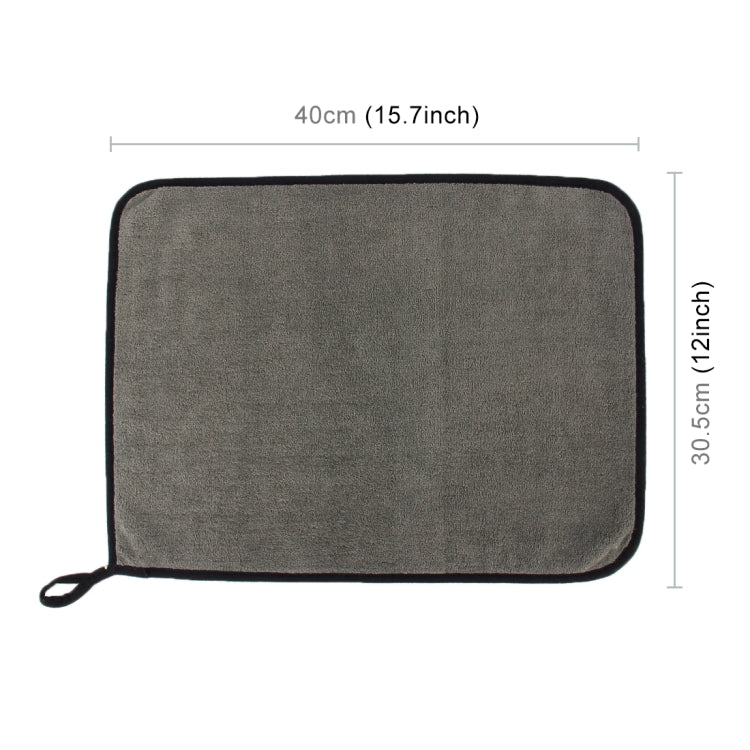 Microfiber cleaning towel, gray rectangle with black border and hanging loop.