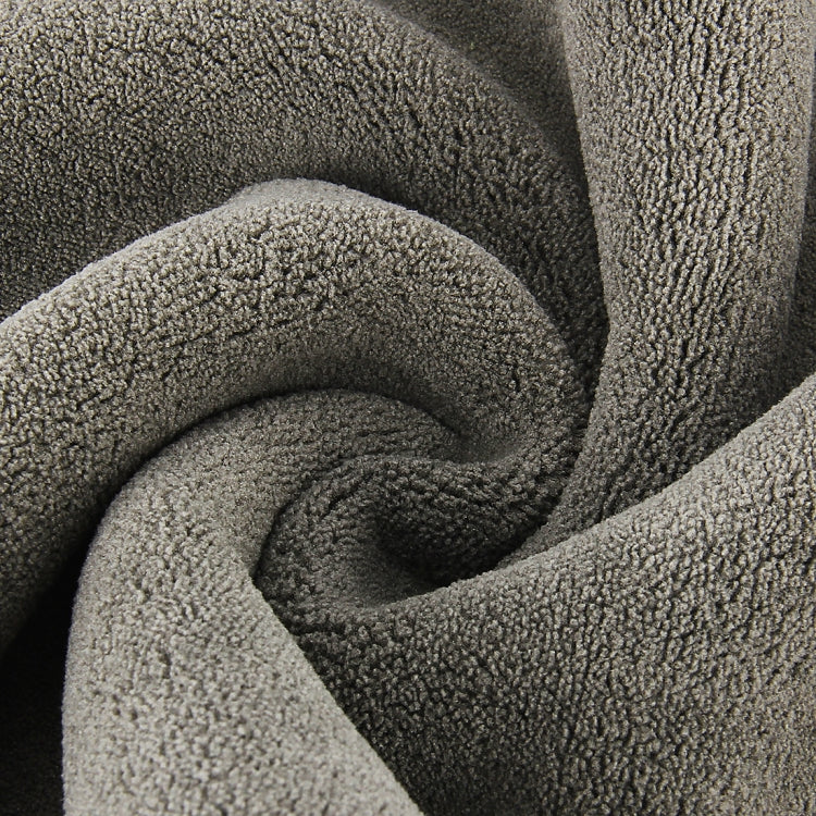 Microfiber cleaning towel fabric close-up, gray looped microfiber texture.