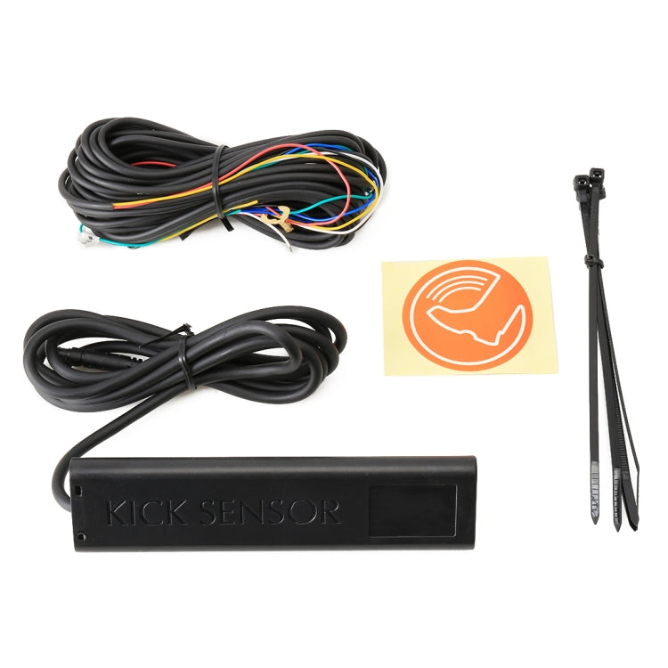 Kick sensor kit with control module, cable harness, and black zip ties