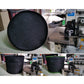 Black fabric grow bag with reinforced stitching and carry handle straps, front view